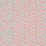 Patterned wallpaper with coral and blue sand dollars on a light blue background