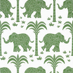 Pattern of green elephants and palm trees on a white background