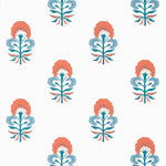 Pattern of stylized floral designs in blue, orange, and white on a white background