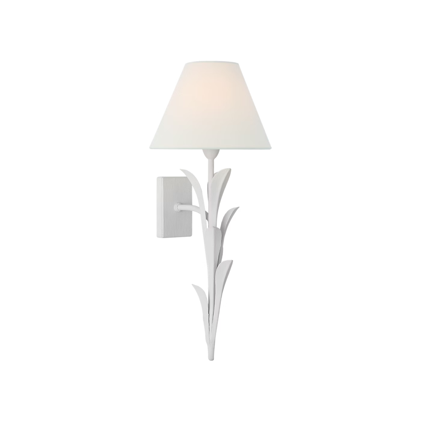A white wall sconce with a sculptural leaf-like metal frame and a tapered white fabric shade, shown lit against a plain white background.