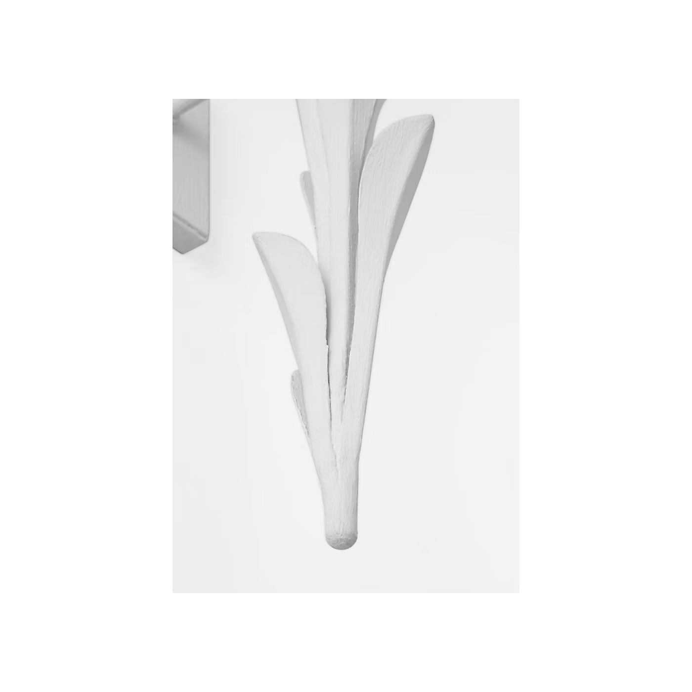 White ceiling light fixture with leaf-like design on a white background