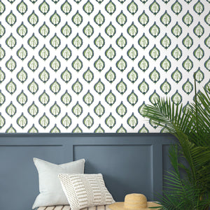 Living room with patterned wallpaper, bench, and plant