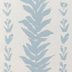 Decorative pattern with blue leaves and floral elements on a light gray background