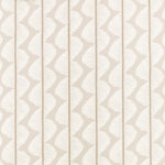 Textured patterned wallpaper with wavy lines on a light background
