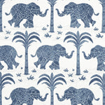 Pattern of blue elephants, palm trees on a white fabric
