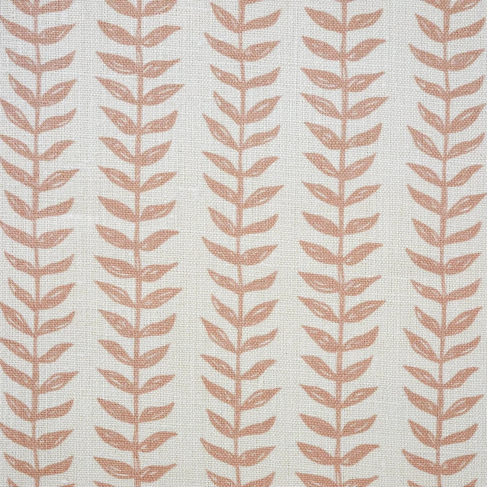 Fabric swatch with a leaf pattern in rose gold on a white fabric  background