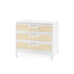 White dresser with three drawers featuring a natural woven design on a white background