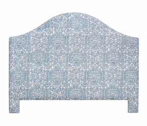 Decorative headboard with blue and white pattern on a white background
