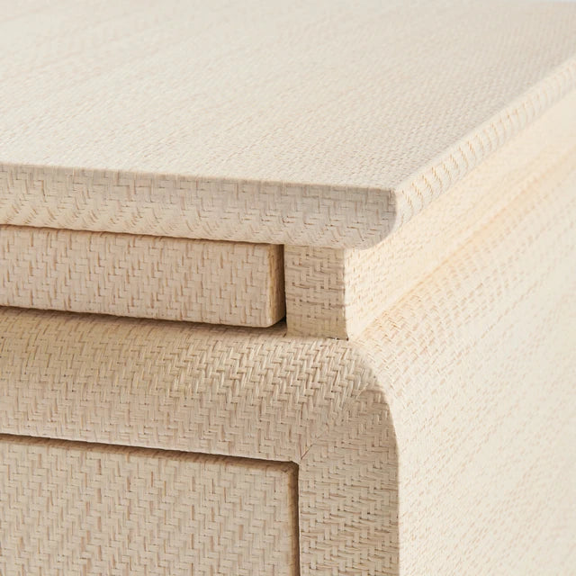 close up of raffia wrapped side table corner 