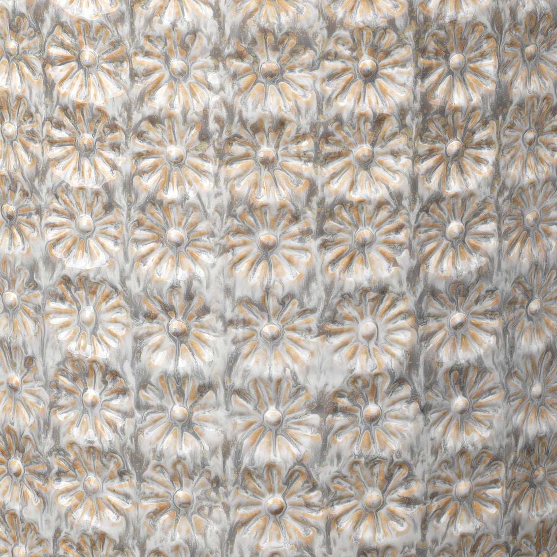 Textured pattern with floral designs in cream and  gray