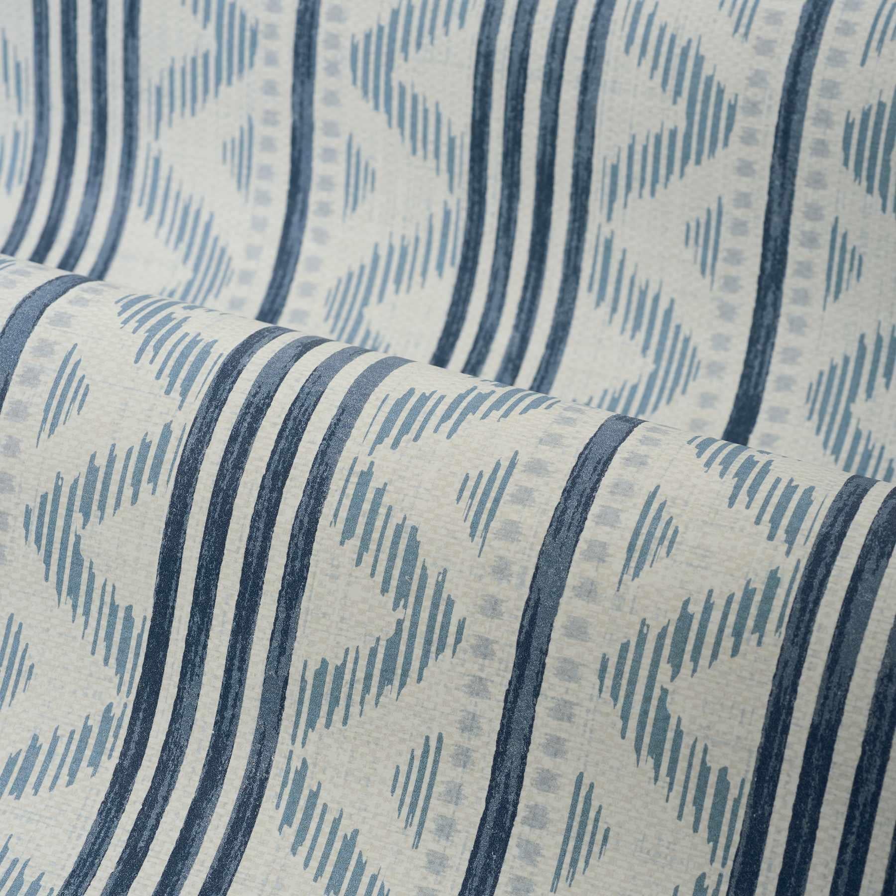 Close-up of fabric with blue and gray striped pattern